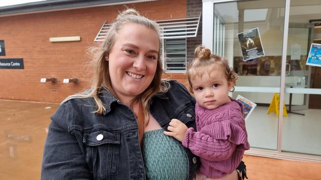 Kristy Weier, with daughter Stella, after she casts her vote in Groom at the 2022 federal election.