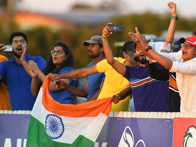 India fans celebrate during game three of the Women's One Day International series between Australia and India at Great Barrier Reef Arena on September 26, 2021 in Mackay, Australia. Picture: Albert Perez