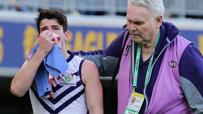 Andrew Brayshaw leaves the field following the incident. Picture: Getty Images