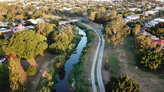 Stunning drone imagery shows dozens of cyclists using the Kedron Brook Bikeway in what its photographer believes will become an "historical document" illustrating how the COVID-19 pandemic helped us rediscover our love of walking and cycling. Picture: Supplied