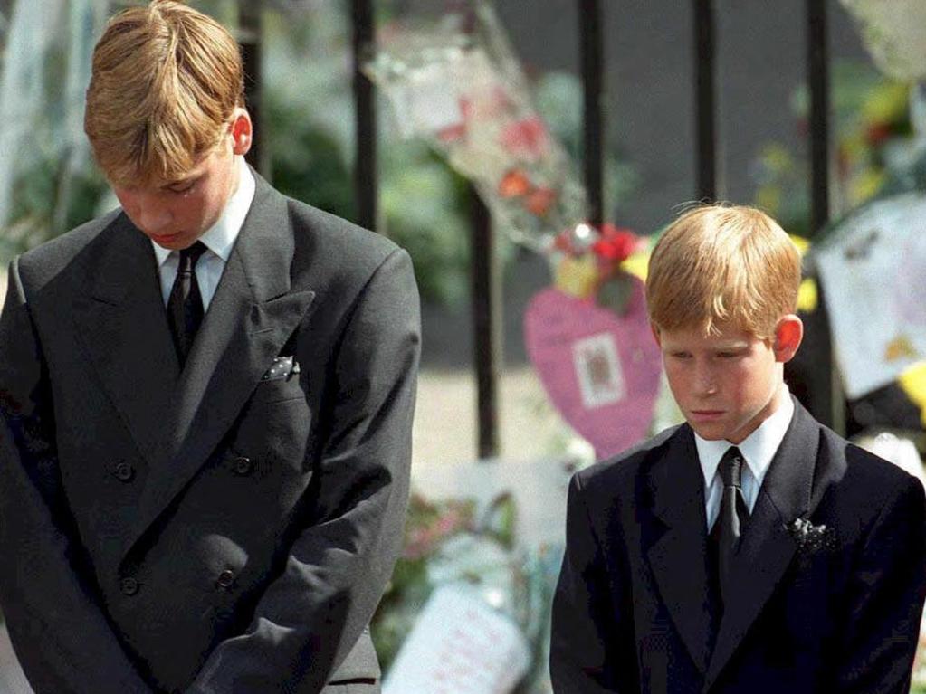 Brothers united. Prince William and Prince Harry bowed their heads as their mother Princess Diana’s coffin was taken out of Westminster Abbey in 1997. Picture: AFP