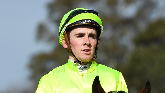 Chris Parnham has cracked it for a Group 1 win aboard Truly Great in the Kingston Town Srakes. Photo AAP Image/James Ross