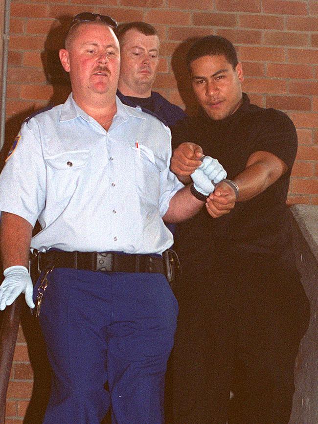 Sione Penisini is led from Waverley Local Court, Sydney. Picture: Mick Tsikas