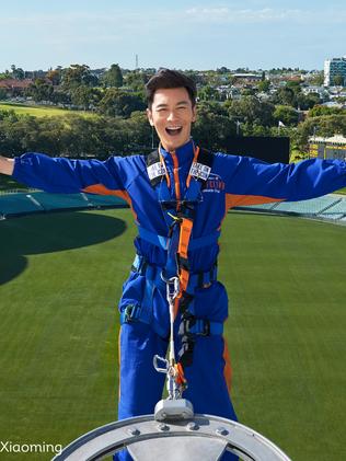 Huang Xiaoming climbs Adelaide Oval’s roof. Picture: South Australian Tourism Commission