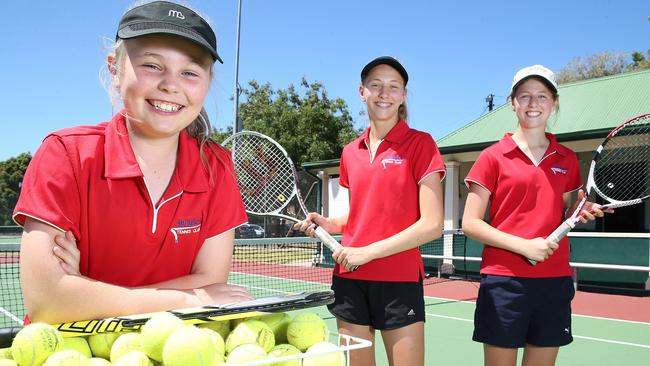 Holdfast Tennis Club players Ella, 10, Holli, 15, and Jade, 13, would benefit from new tennis courts and clubrooms. Picture: Stephen Laffer.