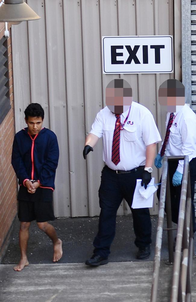 Numan Mohammed is taken into court by Sheriff Officers on Wednesday. Picture: AAP / David Mariuz