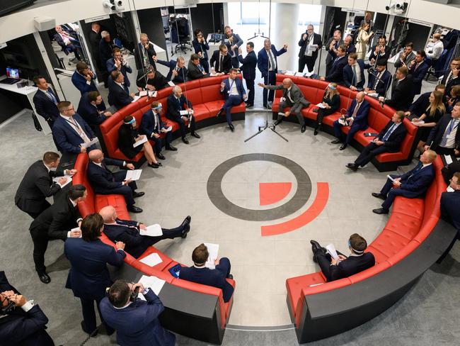 LONDON, ENGLAND - SEPTEMBER 06: Traders, brokers and clerks shout and gesture on the first day of in-person trading at the London Metal Exchange (LME) on September 06, 2021 in London, England. The trading ring, which has been operating since 1877, is the last "open outcry" trading floor in Europe. The LME, where traders determine benchmark prices on industrial metals, moved to electronic-only trades in March 2020 due to the Covid-19 pandemic, but its membership has resisted the permanent closure of the in-person trading floor. (Photo by Leon Neal/Getty Images)