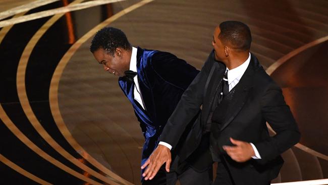 Will Smith slaps Chris Rock onstage during the Oscars. Picture: AFP