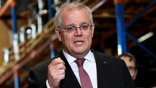 Scott Morrison’s government says the proposed exemption is not a ‘passport’ but a practical measure where a person would not have to apply for a state entry pass to travel between states impacted by COVID-19 restrictions and outbreaks. Picture: Dan Peled