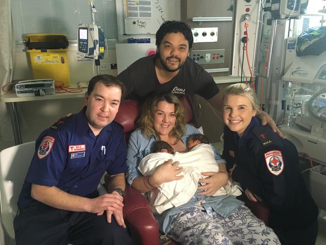 Parents Courtney and Jake Jauhari with their twin boys, Colbhi and Wilbur, and the MICA paramedics Peter Petherbrdige and Sarah Phillips, who saved the babies' lives when they were born on the Calder Freeway. Picture: Supplied