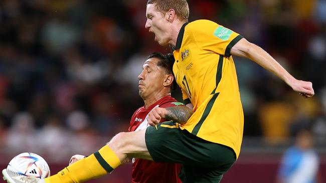 DOHA, QATAR - JUNE 13: Gianluca Lapadula of Peru battles for possession with Kye Rowles of Australia during the 2022 FIFA World Cup Playoff match between Australia Socceroos and Peru at Ahmad Bin Ali Stadium on June 13, 2022 in Doha, Qatar. (Photo by Mohamed Farag/Getty Images)