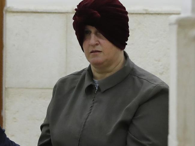 (FILES) In this file photo taken on February 27, 2018 Malka Leifer, a former Australian teacher accused of dozens of cases of sexual abuse of girls at a school, arrives for a hearing at the District Court in Jerusalem. - An Israeli court ruled on May 26, 2020 that an Orthodox Jewish teacher accused of child sex abuse in Australia was mentally fit to stand trial, bringing her closer to extradition after years of legal battles. Judge Chana Lomp of the Jerusalem district court said of Malka Leifer that she had "decided to accept the expert panel's opinion, the defendant is fit to stand trial". Lomp said she would set a date for the renewal of the extradition process. Leifer, who was not in court today, is accused of child sex abuse while she was a teacher and principal at an ultra-Orthodox Jewish school in Melbourne, where she had emigrated from her native Israel. (Photo by AHMAD GHARABLI / AFP)