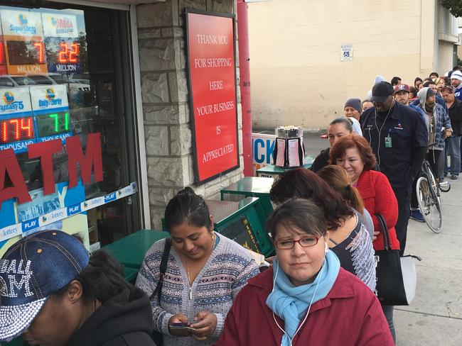 Scenes like this outside a California liquor store have been seen all across the US ahead of the record lottery draw. Picture: Damian Dovarganes/AP Photo