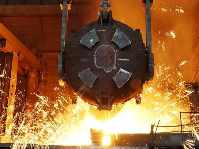 A worker works at a furnace at a steel plant in Dalian, China, earlier this month. PHOTO: REUTERS