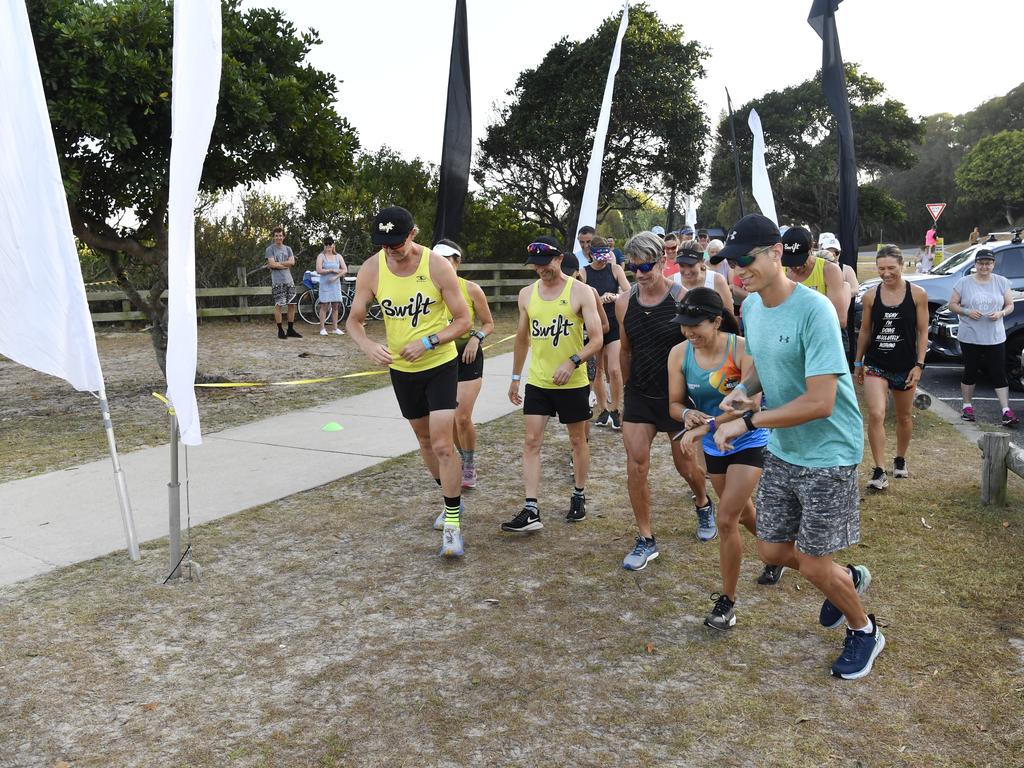 Competitors take off from the Whiting Beach start of the Yamba Triathlon Fun Run on Saturday morning.