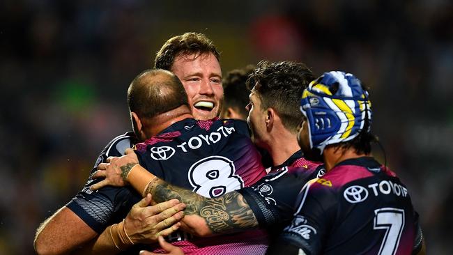 TOWNSVILLE, AUSTRALIA — AUGUST 09: Gavin Cooper of the Cowboys celebrates after scoring a try during the round 22 NRL match between the North Queensland Cowboys and the Brisbane Broncos at 1300 SMILES Stadium on August 9, 2018 in Townsville, Australia. (Photo by Ian Hitchcock/Getty Images)