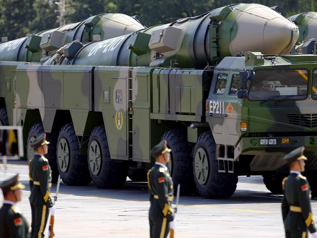 Military vehicles carrying DF-21D ballistic missiles roll to Tiananmen Square during a military parade in Beijing, China. Picture: Damir Sagolj