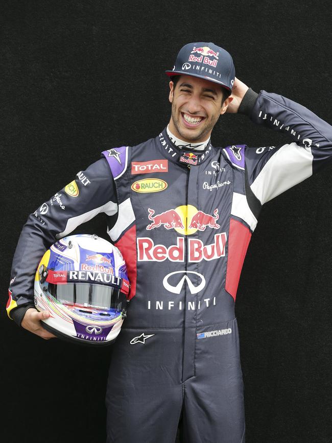 Red Bull driver Daniel Ricciardo of Australia laughs as he poses for a picture during a driver photo session ahead of the Australian Formula One Grand Prix at Albert Park in Melbourne. Picture: AP Photo/Rob Griffith