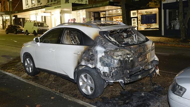 One of the burnt cars in Woollahra / Picture: Gordon McComiskie