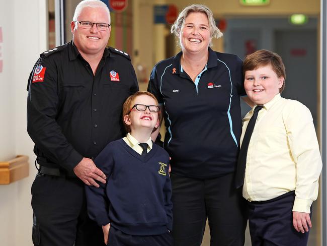 Nurse Rachel Macfarlane with her partner, firefighter Ross Bramich and their and sons, Will, 7, and Zac, 9. Picture: Tim Hunter