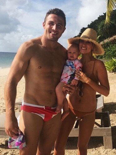 Sam Burgess with wife Phoebe and their daughter, on holiday. Photo: Instagram