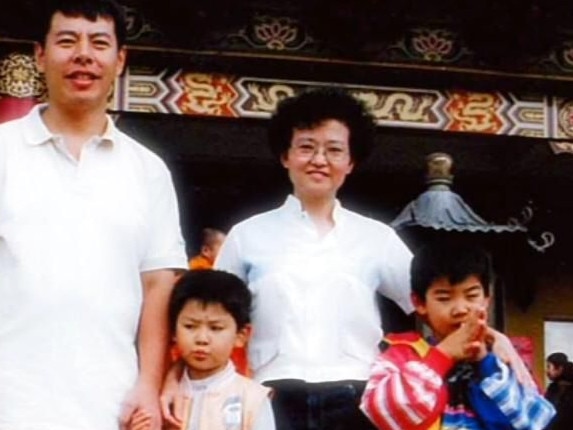 Min Lin and wife Lily with sons Henry and Terry, who were murdered in their North Epping home by Robert Xie in July 2009.