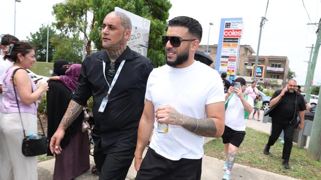 Adrian Portelli giving away gift cards at Coles Fairfield. Picture: Rohan Kelly.