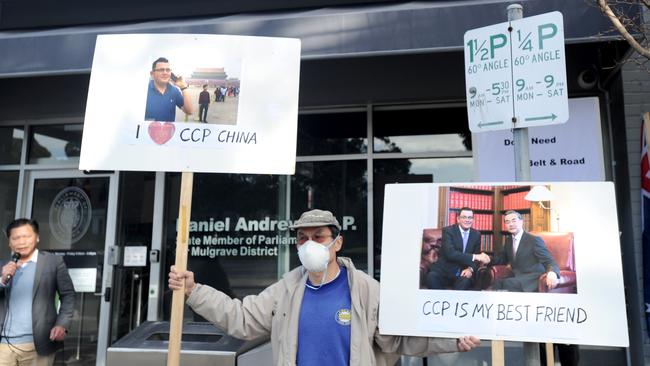 Protesters gather outside Daniel Andrews' electoral office at Noble Park to voice their concerns about Victoria's increased financial links with China and its communist regime. Picture: Andrew Henshaw