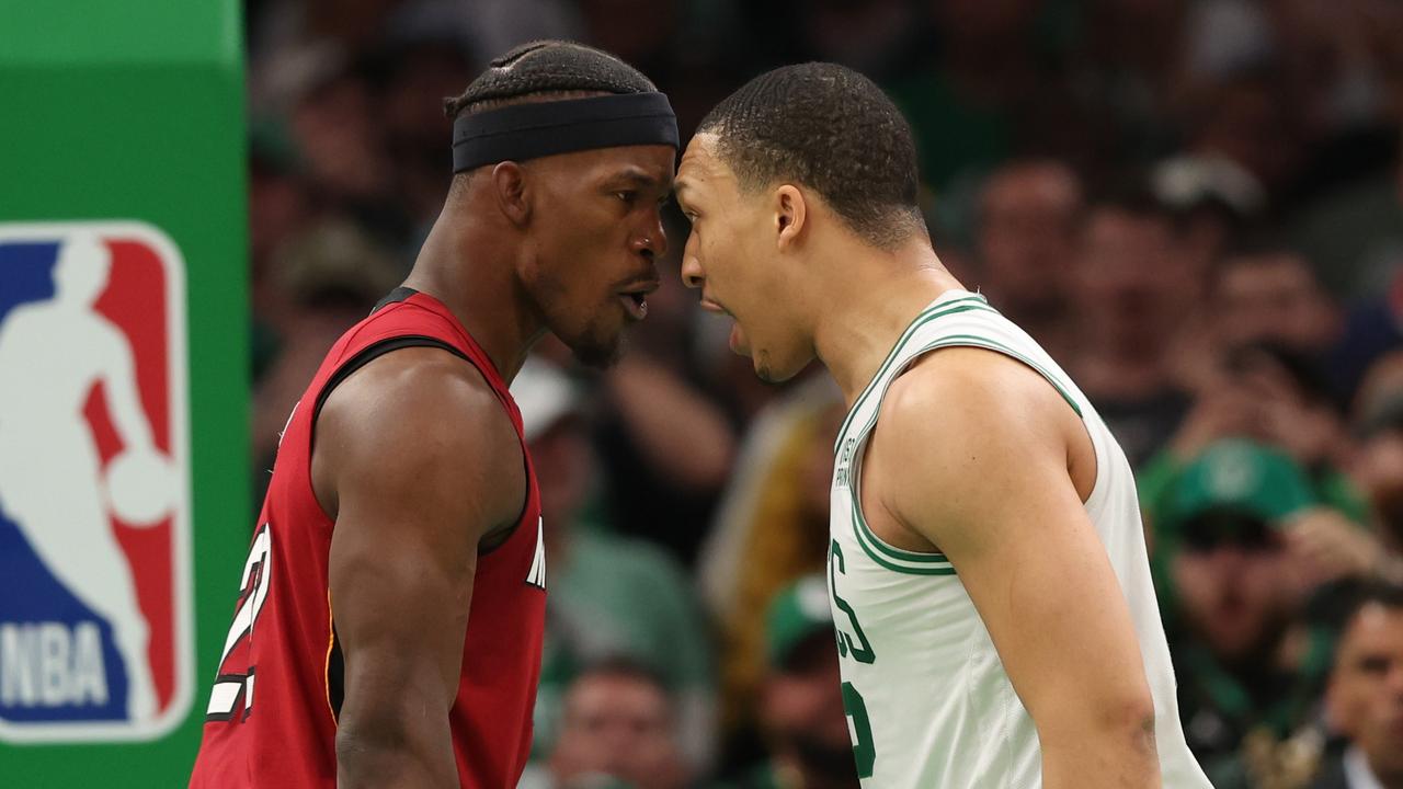 Jimmy Butler #22 of the Miami Heat exchanges words with Grant Williams #12 of the Boston Celtics during the fourth quarter. (Photo by Adam Glanzman/Getty Images)