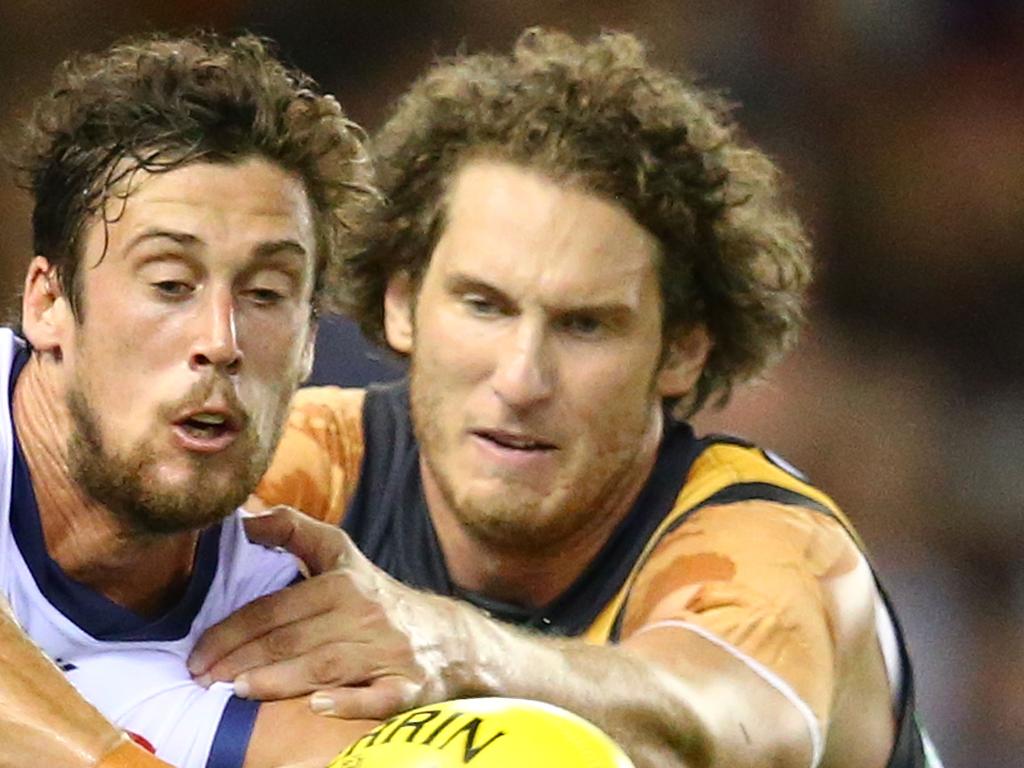 Richmond’s Tyrone Vickery (right) competes for the ball with the Crows’ Kyle Hartigan in 2016. Picture: Getty