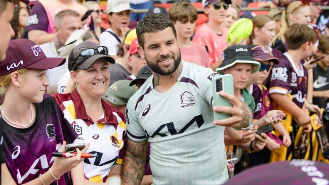 Leonie Sokoll gets a selfie with Adam Reynolds as daughter Amelia Ellis watches at the Brisbane Broncos Captain's Run and Toowoomba Fan Day at Toowoomba Sports Ground, Saturday, February 15, 2025. Picture: Kevin Farmer