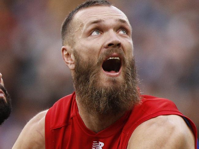 Brodie Grundy of the Magpies and Max Gawn of the Demons contest the ruck during the Round 12 AFL match between the Collingwood Magpies and the Melbourne Demons at the MCG in Melbourne, Monday, June 10, 2019. (AAP Image/Daniel Pockett) NO ARCHIVING, EDITORIAL USE ONLY