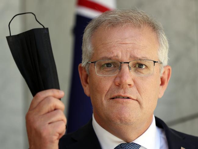 Prime Minister Scott Morrison makes a point about masks at his press conference in Canberra on Wednesday. Picture: Gary Ramage