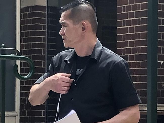 Yew Choy Chong, 46, of Campsie, outside Manly Local Court after pleading guilty to breaking his forearm's arm with a piece of metal during a workplace assault. Picture: Jim O'Rourke