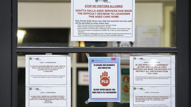 Warning signs at the entrance to the Doutta Galla nursing home in Yarraville. Picture: Ian Currie