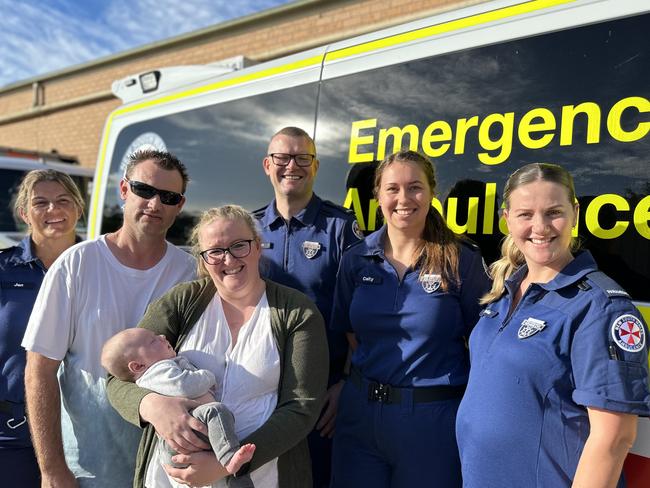 PICTON, NSW - Bargo couple Sarah and Brad Cambridge and their 10-week son Riley reunited with the paramedics who came through the door as Sarah was delivering her baby with a 000 operator talking her through the process. Brad was at the doctors, and they swung by to pick him up on the way through. Paramedics: Jen White, Olivia Hogan, Bob Taylor and Caitlin Reid.