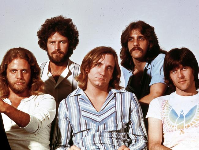 FILE: Randy Meisner, founding member of The Eagles, has died at 77. UNSPECIFIED - JANUARY 01:  Photo of Glenn FREY and Joe WALSH and Don HENLEY and Don FELDER and EAGLES and Randy MEISNER; L-R: Don Felder, Don Henley, Joe Walsh, Glenn Frey, Randy Meisner - posed, studio, group shot - Hotel California era  (Photo by RB/Redferns)