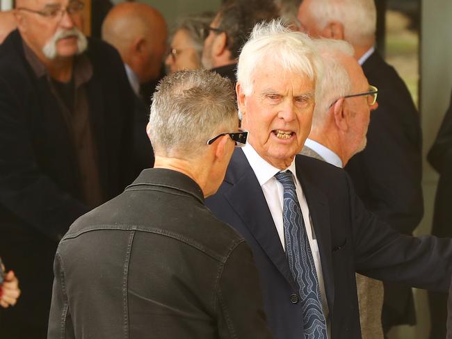 John Inverarity (right) chats after the funeral. Picture: Alison Wynd