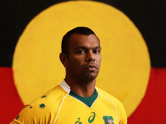 Kurtley Beale poses for a portrait with a mural of the aboriginal flag during The 2016 Wallabies Jersey Launch at All Sorts Sports Factory in Alexandria, Sydney. Pic Brett Costello