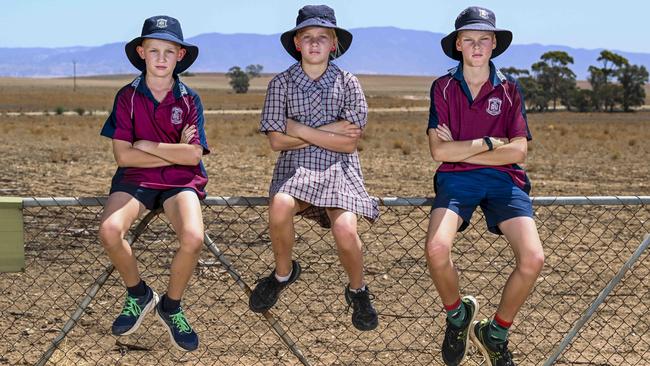 Kids of the drought Kody Chapman,9,Matisse Arthur,11,and Noah Zwar ,10 from Booleroo Centre District school during a visit to the drought effected  mid north of South Australia.Wednesday,March.,5,2025.Picture Mark Brake