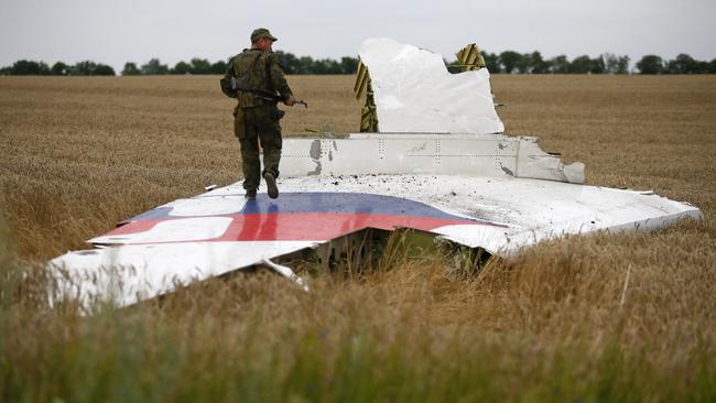 Parts of the plane were scattered in nearby fields. Picture: Reuters