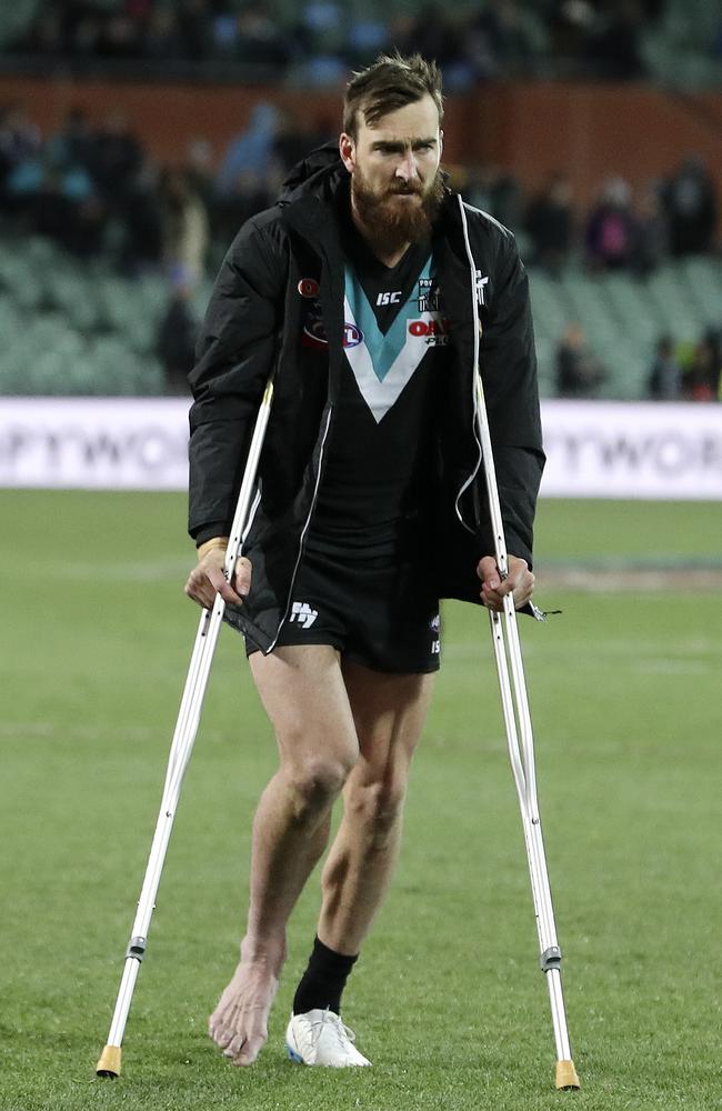 Leaving Adelaide Oval after breaking his ankle against West Coast in Round 21 last year. Picture: Sarah Reed.