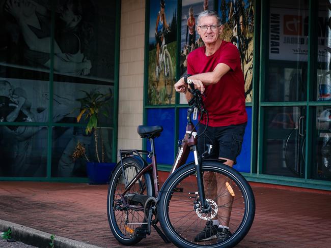 Nigel Withers with his best selling e-bike as fuel prices begin to bite. Picture: Glenn Campbell.