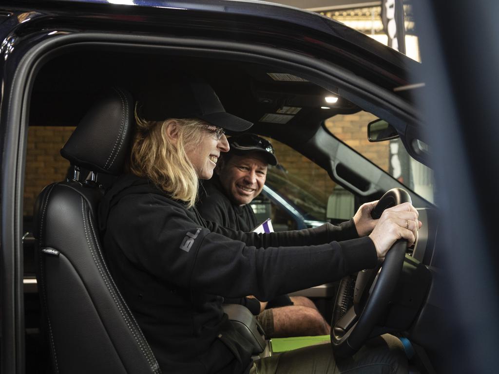 Leanne and Glenn Cooper, in a Ford 2022 super duty tremor on show at the Performax International stand at the Queensland Outdoor Adventure Expo at the Toowoomba Showgrounds, Saturday, July 30, 2022. Picture: Kevin Farmer