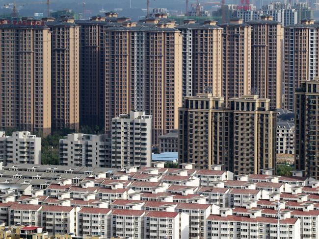 --FILE--A view of a cluster of residential apartment buildings in Xuchang city, central China's Henan province, 9 September 2016.One of China's largest property magnates, Wang Jianlin, warned that his country's property market had the \\"biggest bubble in history.\\" But home buyers in key Chinese cities in September showed scant regard for such warnings, maintaining a frenetic pace of purchases. Preliminary data for the month showed that residential floor space sold in 52 cities rose 26 per cent in the first 25 days of September (see the first chart), in line with August's 27 per cent increase and higher than July's 13 per cent expansion, according to data collected from local land bureaus by NSBO, a China-focused investment bank.