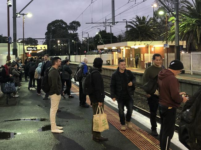 Commuters at Blackburn station on the platform await further instructions after disruptions to their morning service.Picture: Supplied.