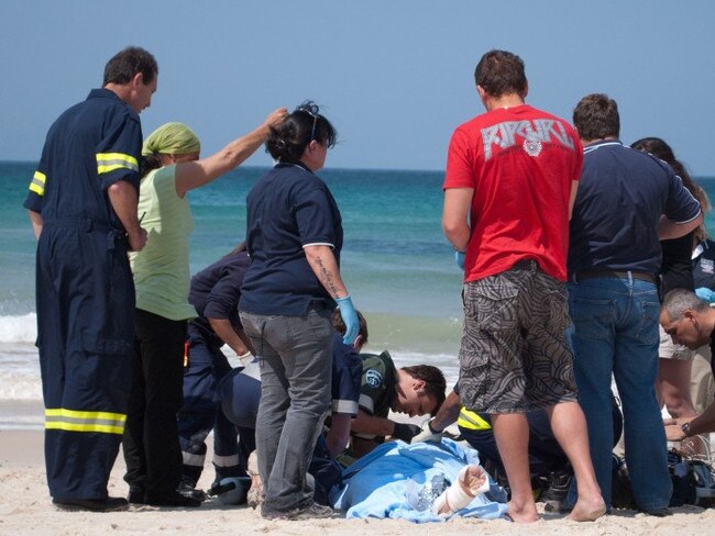 THIS is the horrific moment a Brit lost his leg in a great white shark attack as a group of heroic swimmers dragged him to shore.