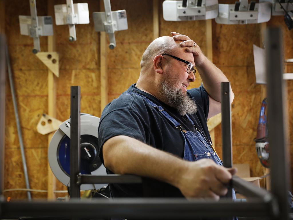 Jack Lyons, a contractor working on massive rocket test stands for NASA, may not see a dollar from the shutdown period — so he’s working on a small side business making props for marching bands in Madison, Alabama. Picture: AP Photo/David Goldman 