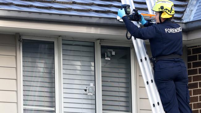 NSW Police at the scene of the shooting in Steeple Pl on Friday, the morning after the attack. Picture: NewsWire/Damian Shaw