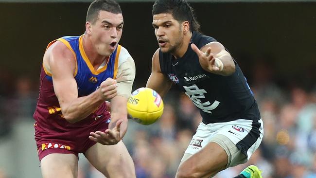 Brisbane free-agent midfielder Tom Rockliff, left, is expected to declare his intent to take up free agency with Port Adelaide rather than Carlton. Picture: Chris Hyde (Getty Images)